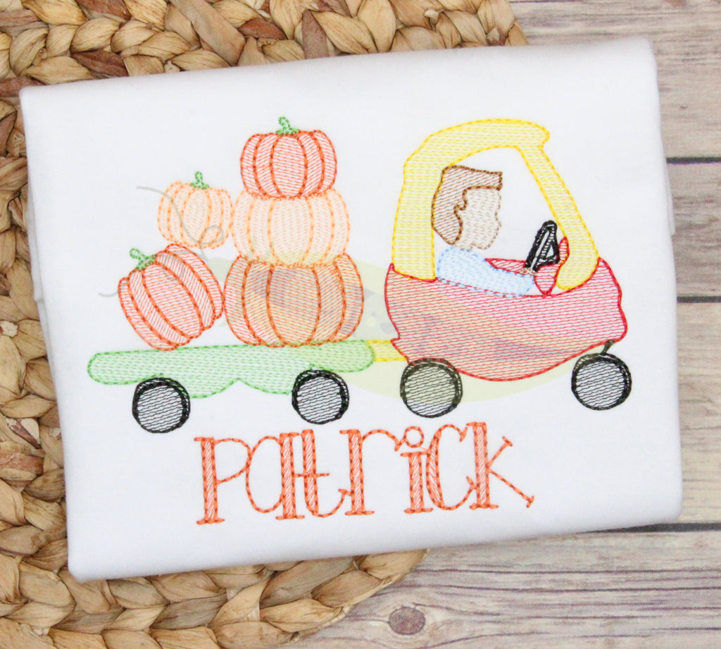 Boy Coupe Pulling Pumpkins