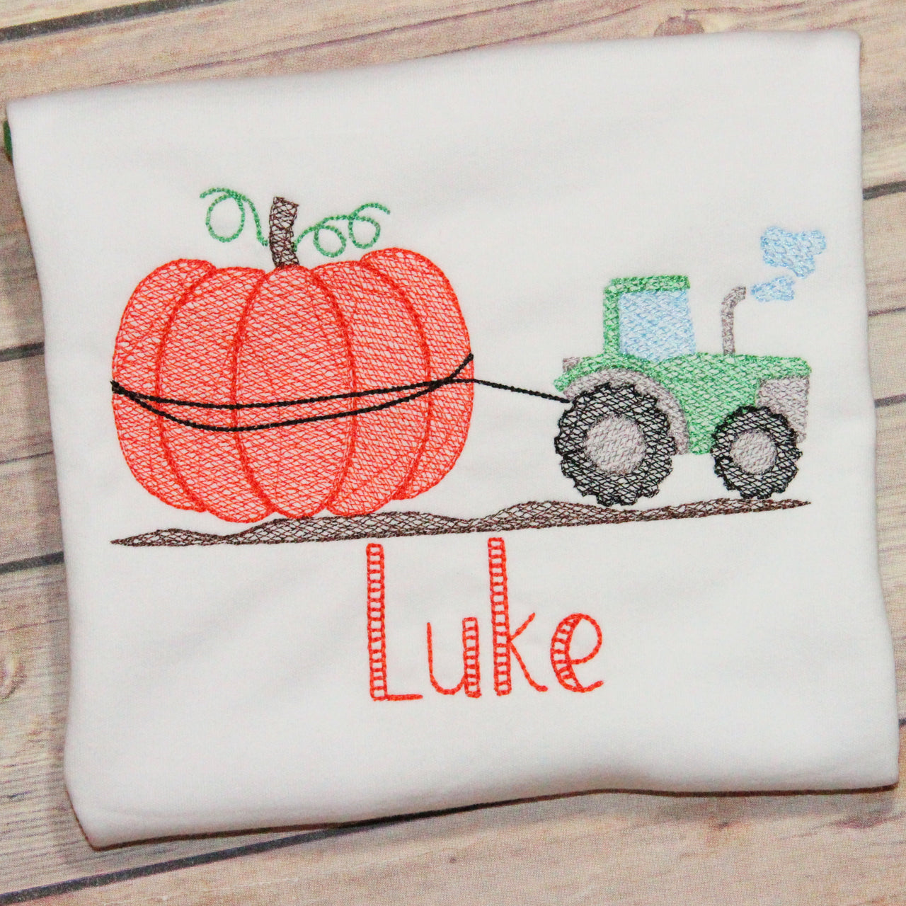 Tractor Pulling Pumpkin Embroidery Design
