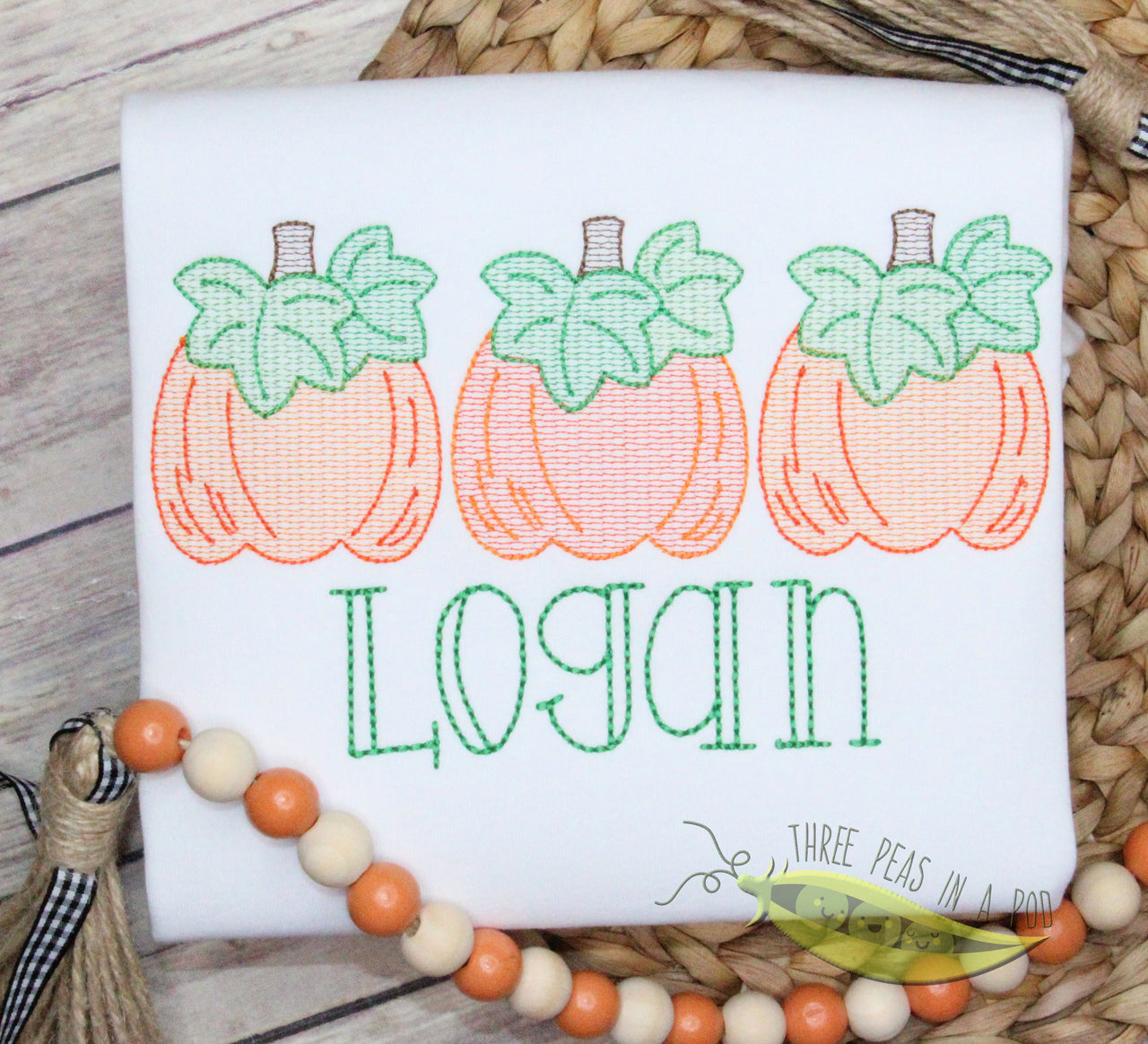 Three Pretty Pumpkins with Leaves