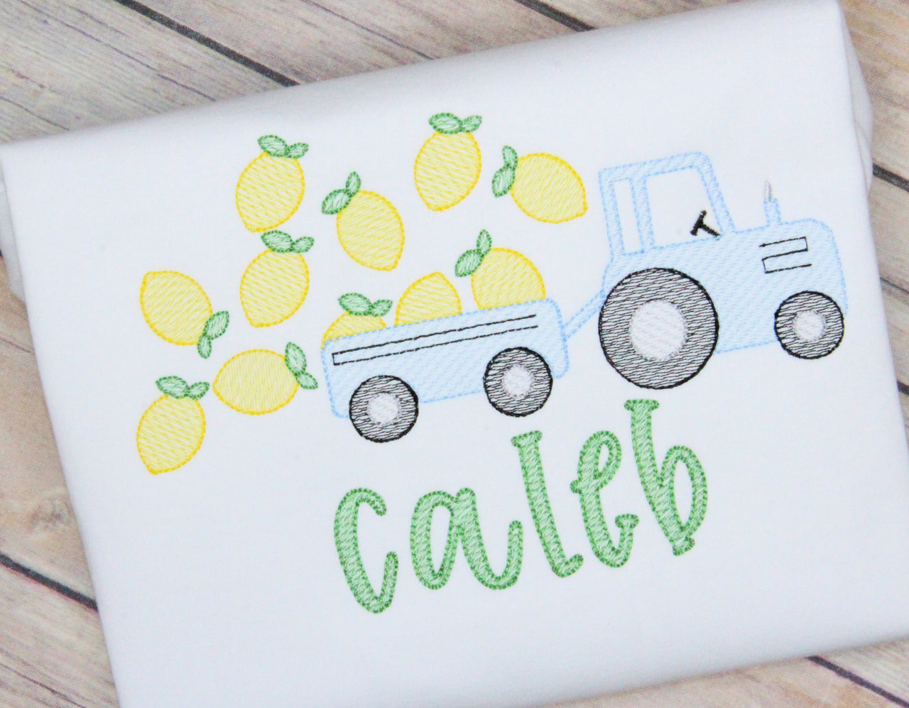 Tractor with Lemons Embroidery Design