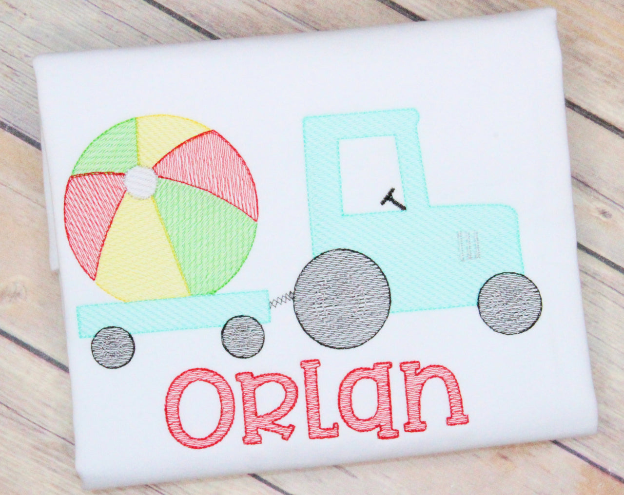 Beach Ball on Tractor Embroidery Design